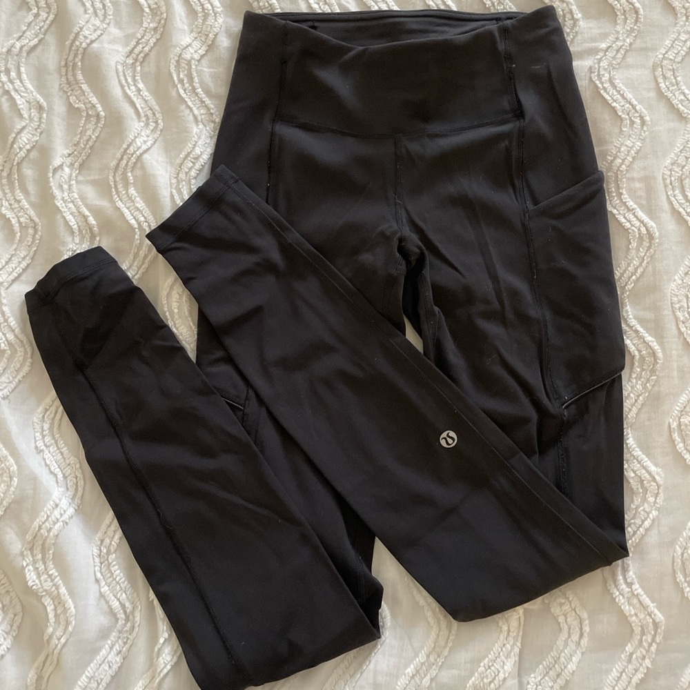 size 2 lululemon fast and free leggings with side pockets, only worn once